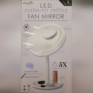 L.E.D. mirror with fan, removable 5x magnification mirror & accessory tray.